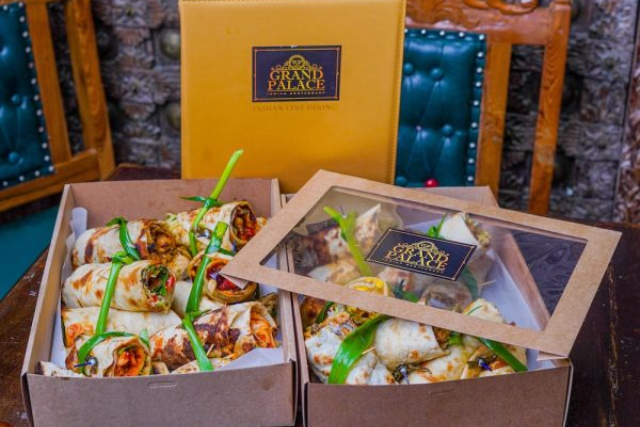 Indian catering box spread ready for pickup by a Sydney CBD office