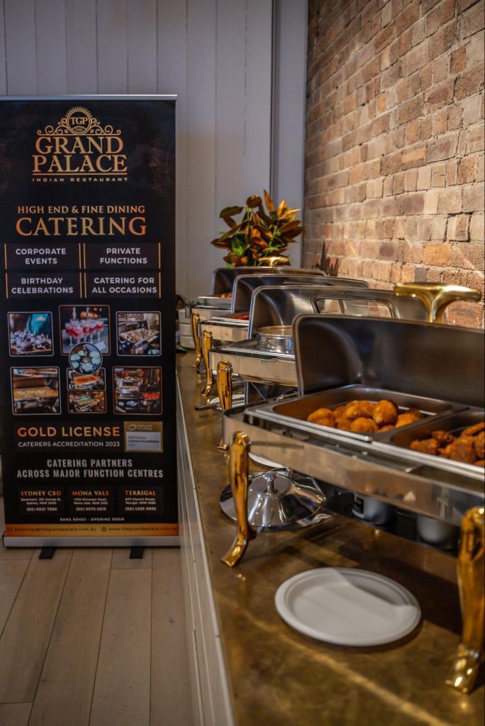 Chafing dishes of freshly prepared Indian catering food set up for a Sydney event