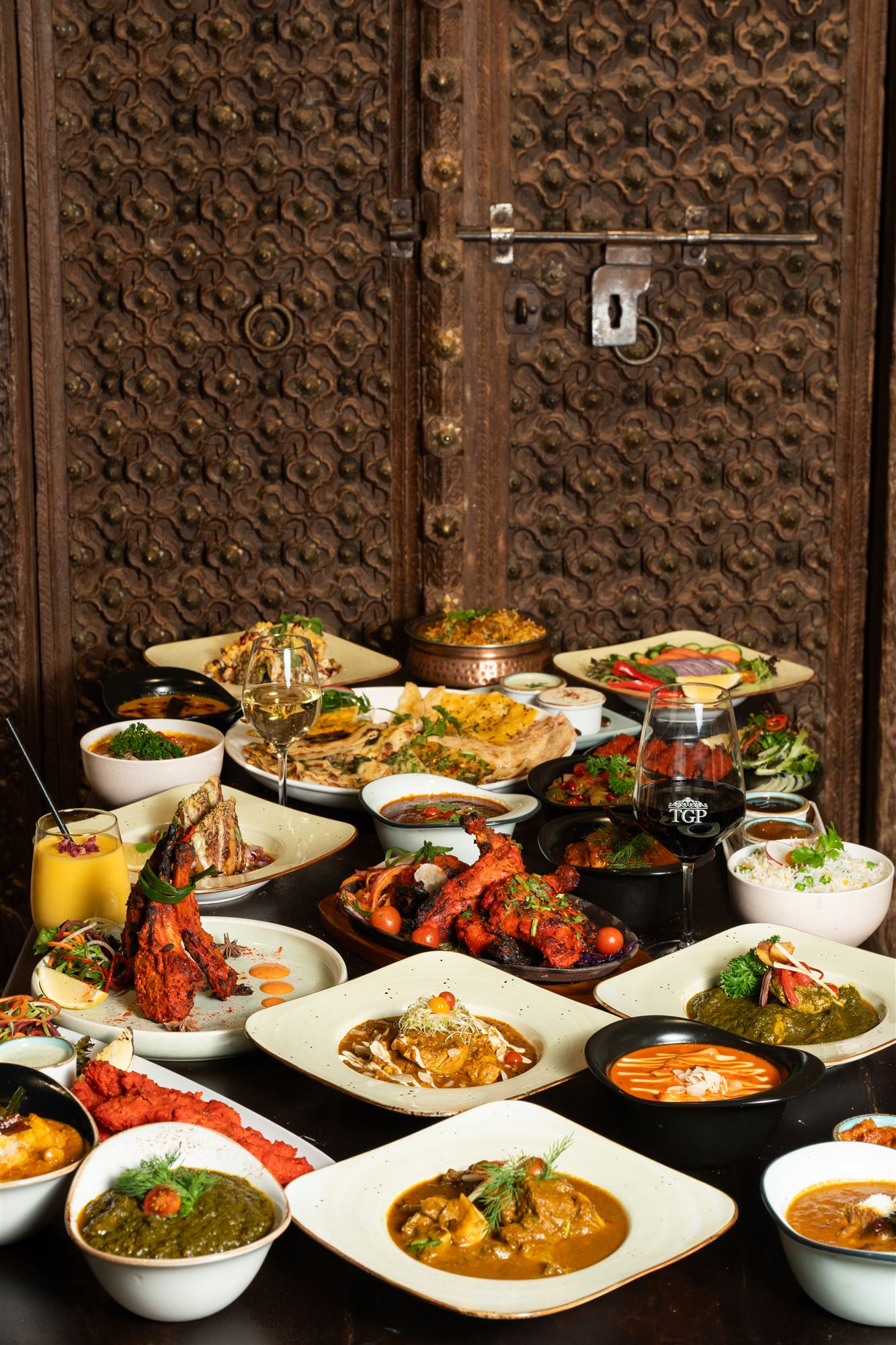 Dining at The Grand Palace, set beneath the restaurant's hand-carved antique doors